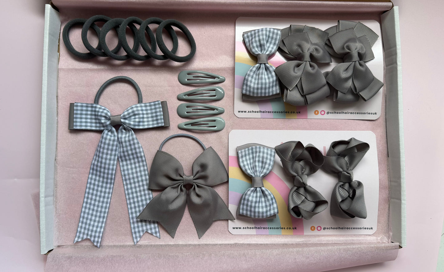 Grey school hair bundle contents with matching bows and clips