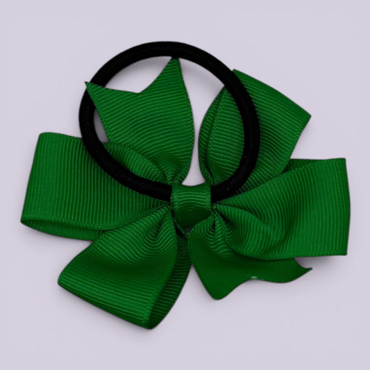 Emerald green pinwheel bow bobble on card