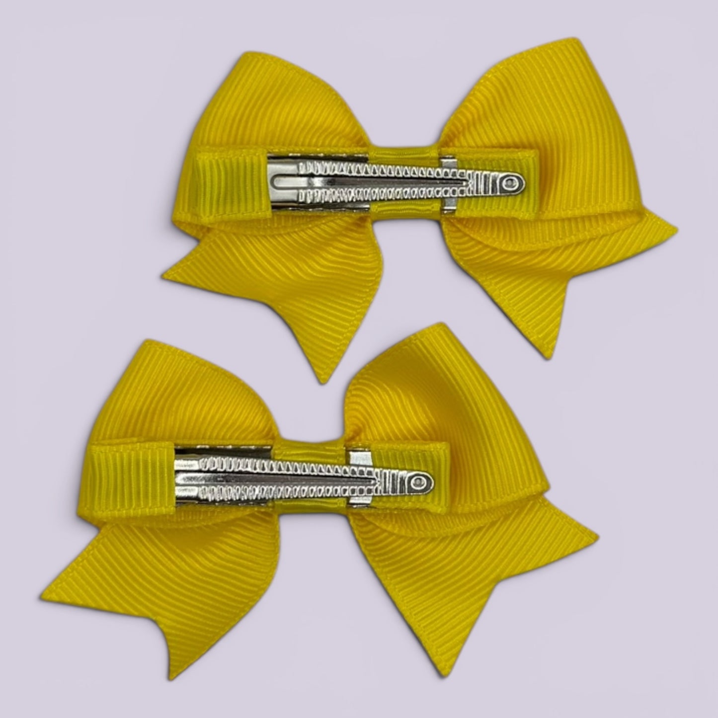 Yellow small bow mini clips for school hairstyles