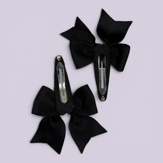 Black butterfly snap clips on card
