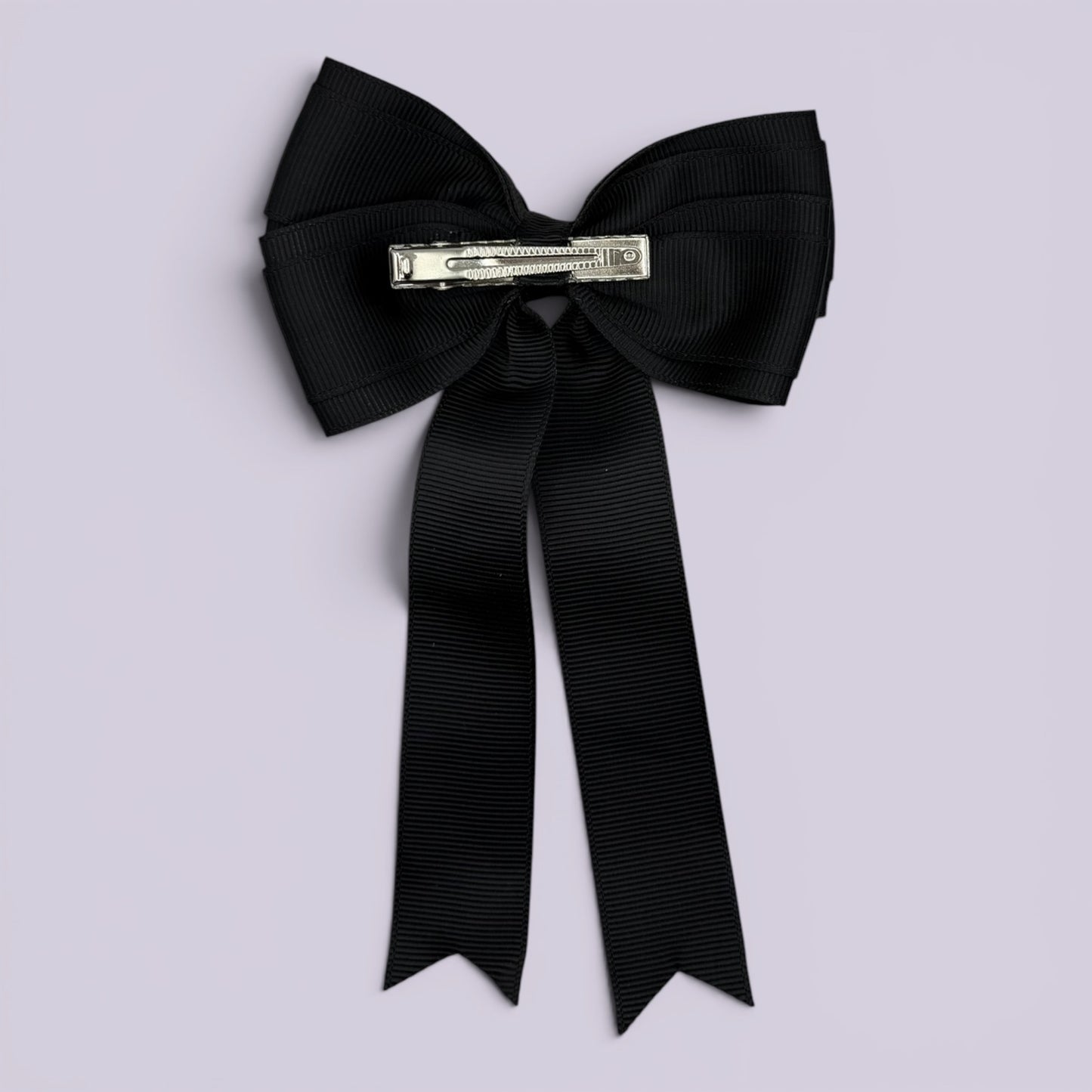 Black tailed bow clip on card