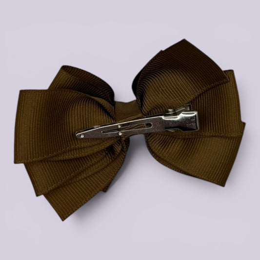 Brown pinwheel bow clip on card