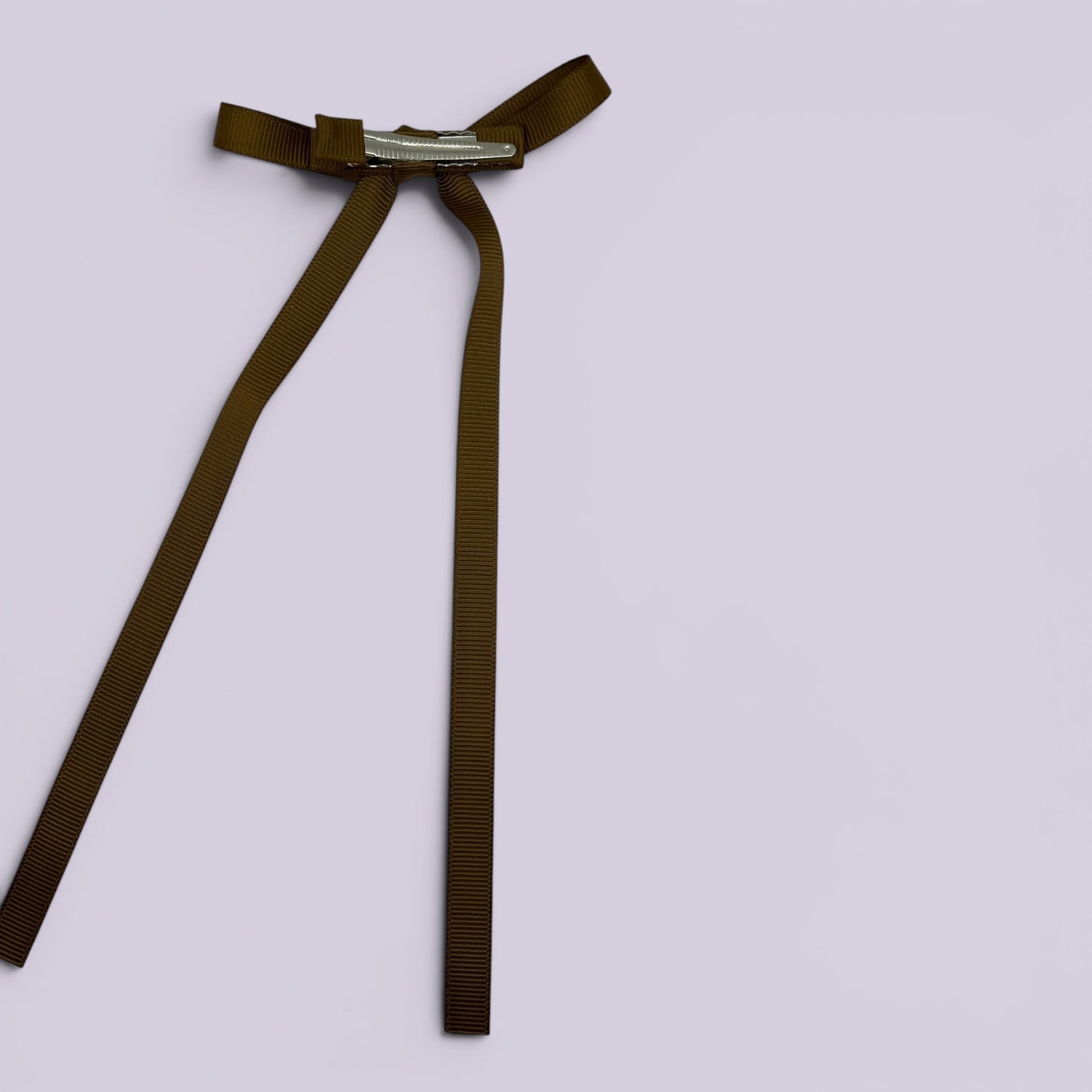 Brown tailed bow clip