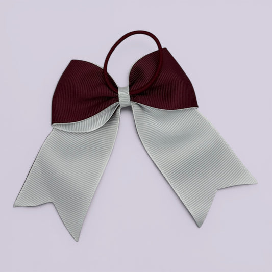 Burgundy maroon and white bow bobble on card