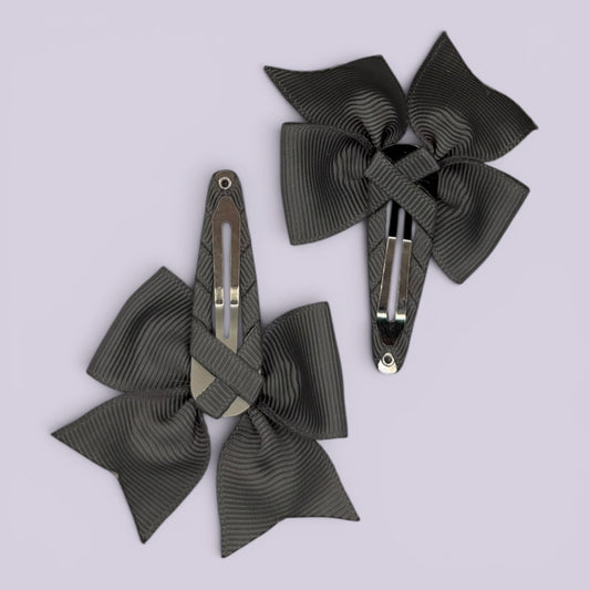 Grey butterfly snap clips on card