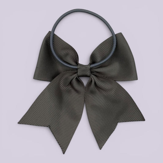 Grey four tailed bow bobble on card