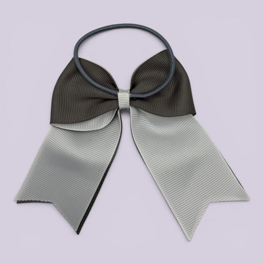 Grey and white bow bobble on card