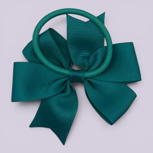 Jade green pinwheel bow bobble on card