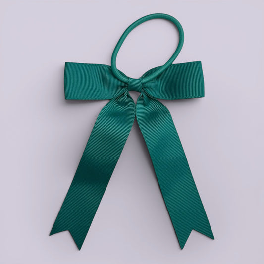 Jade green tailed bow bobble on card