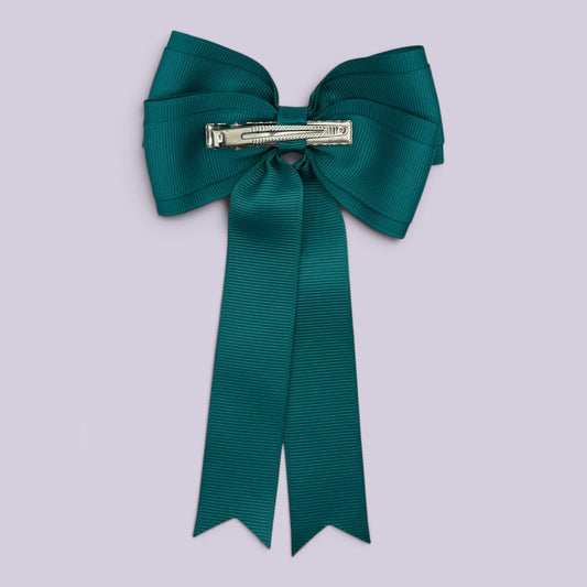 Jade green tailed bow clip on card