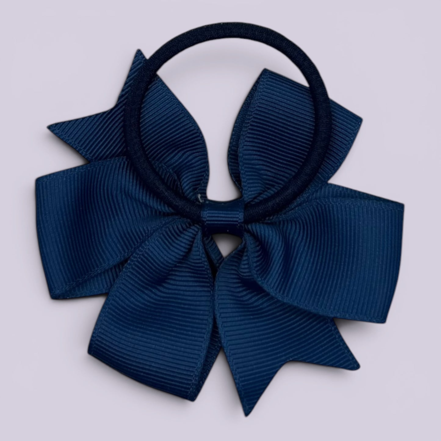 Navy blue pinwheel bow bobble on card