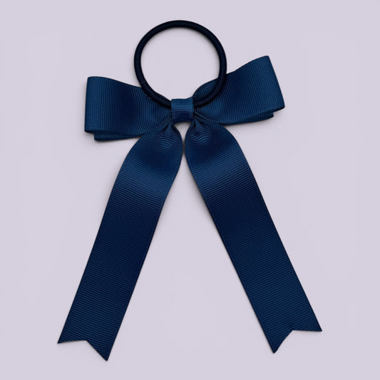 Navy blue tailed bow bobble on card