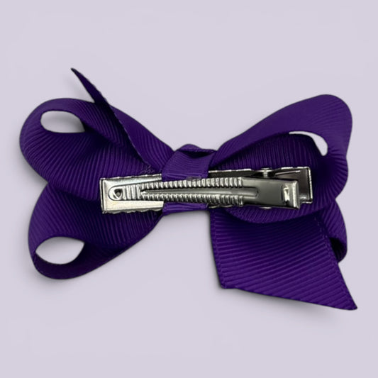 Purple small bow clip on card