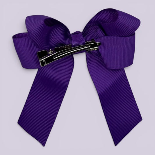 Purple tailed bow clip on card