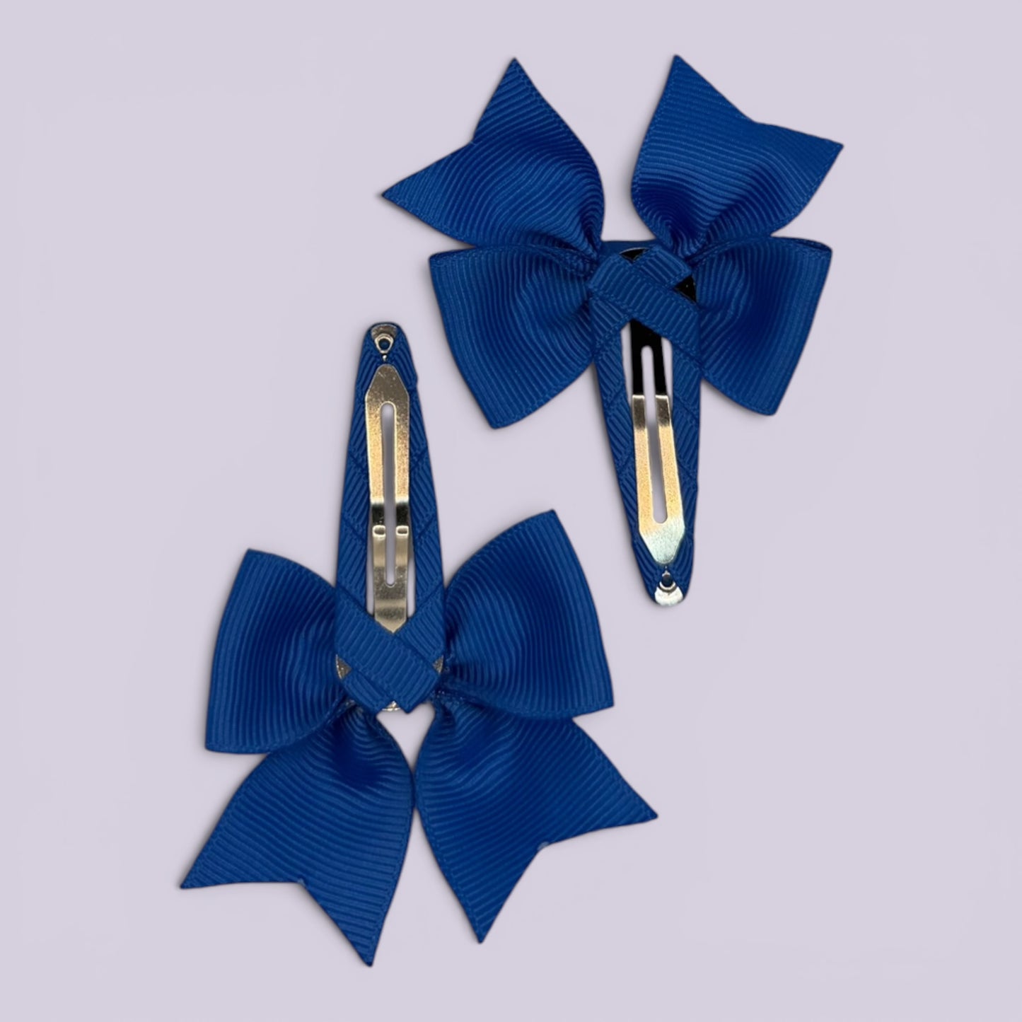 Royal blue butterfly snap clips on card