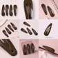 Brown school snap hair clips