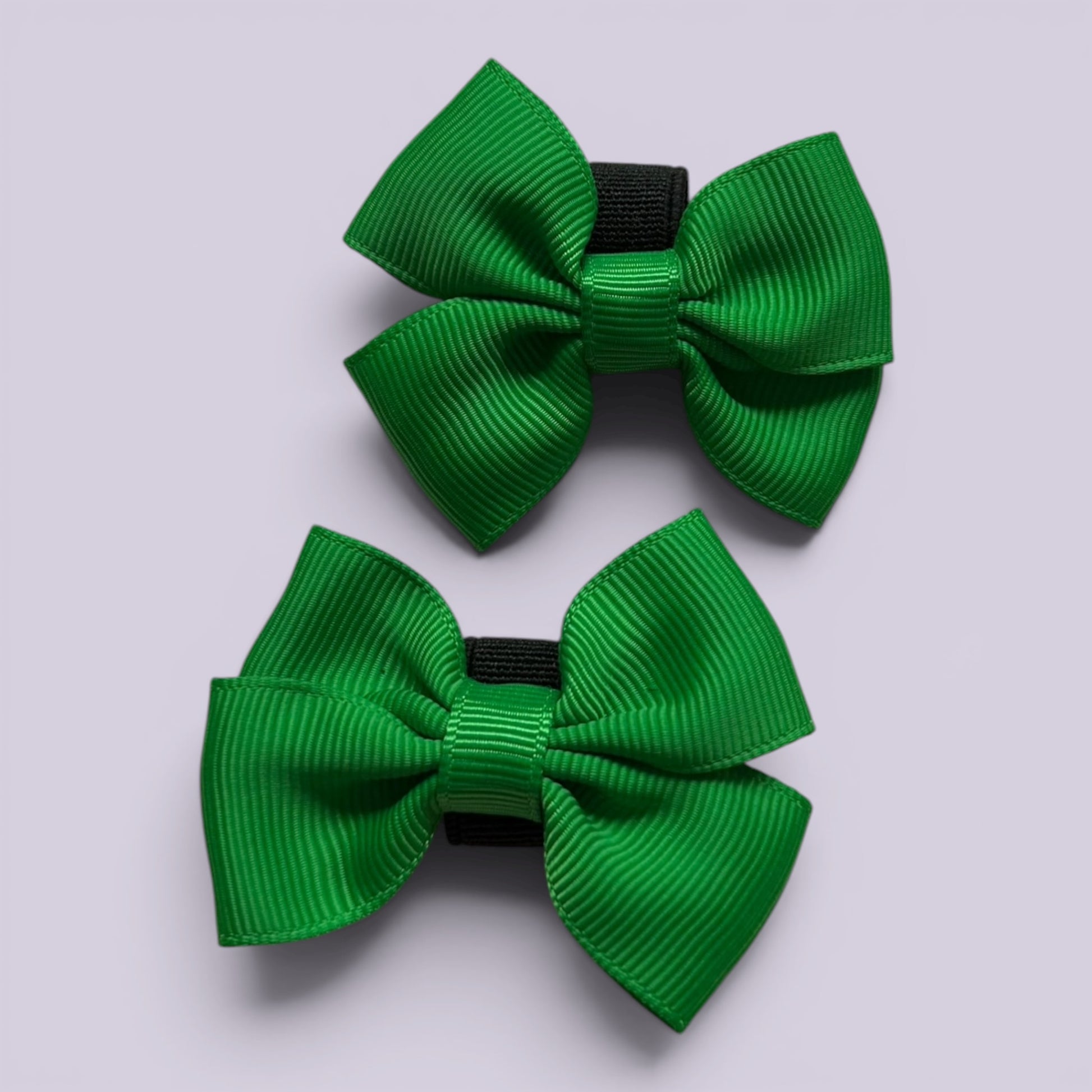 Emerald green shoe bows close up