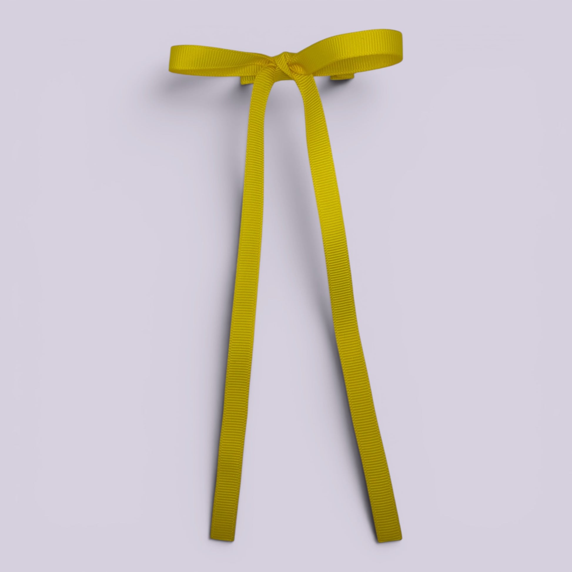 Yellow large tailed bow clip