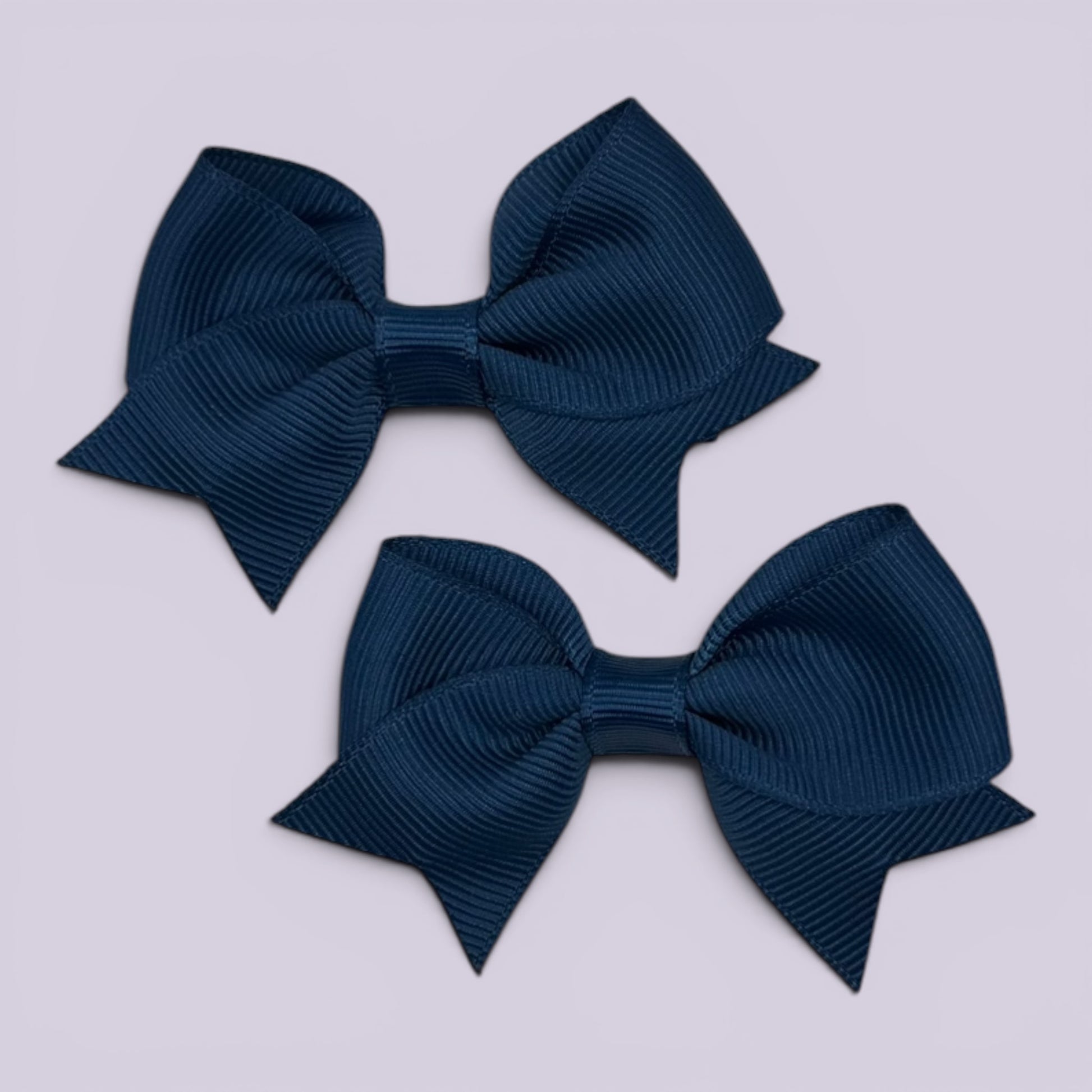 Navy blue small school hair bow mini clips pair