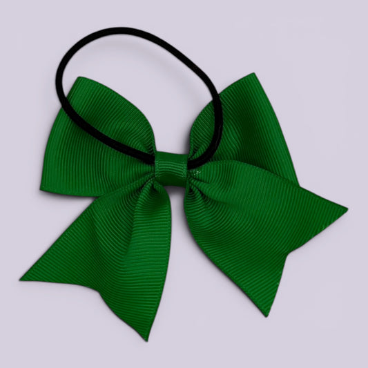 Emerald green four tailed bow bobble on card