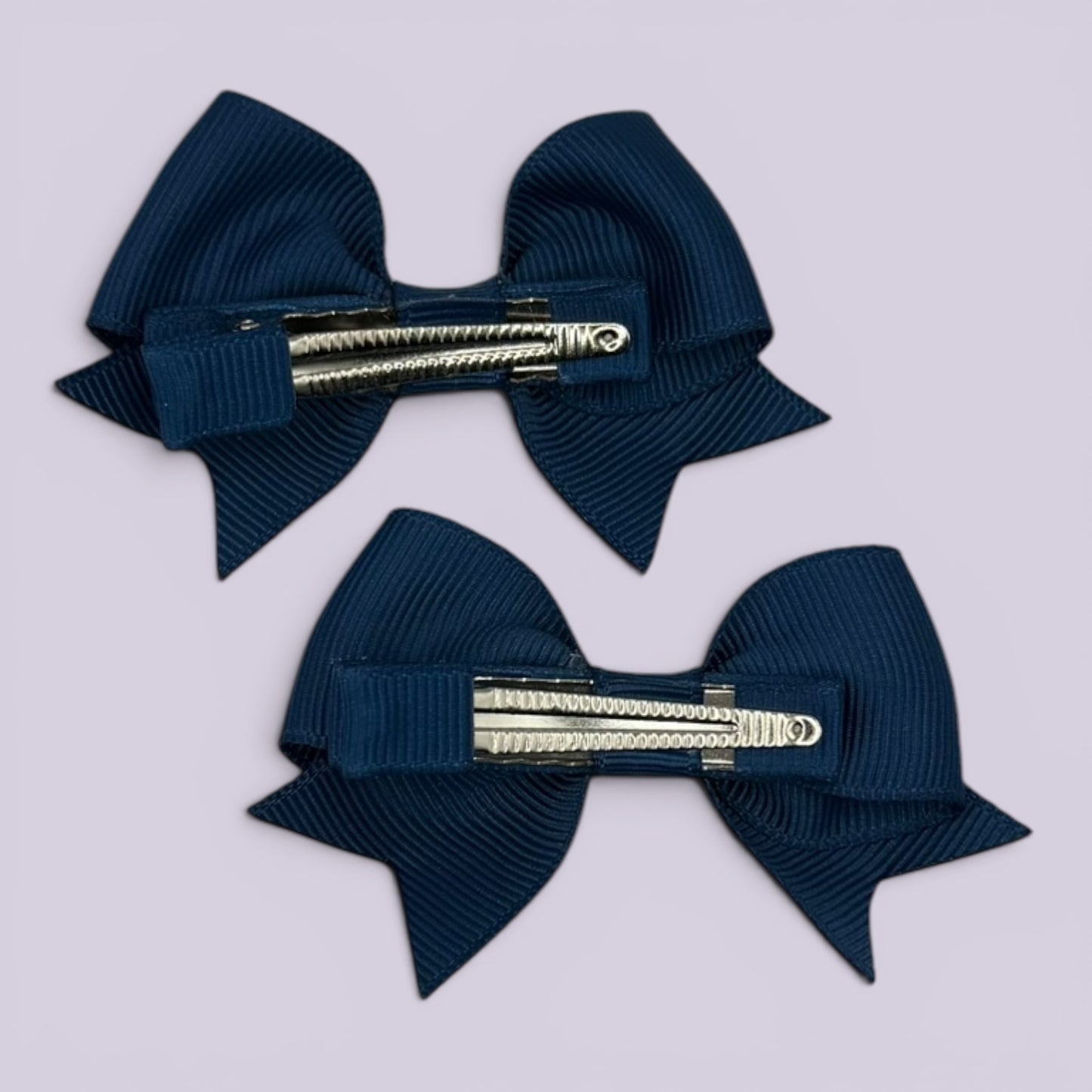 Navy blue small bow mini clips for school hairstyles