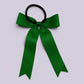 Emerald green tailed bow bobble on card