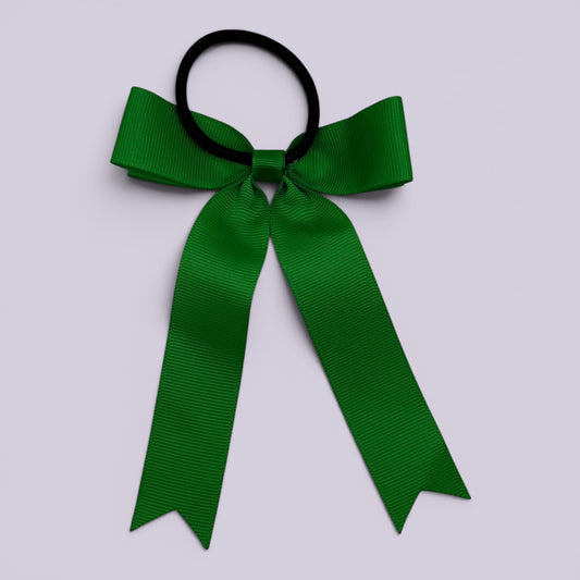 Emerald green tailed bow bobble on card