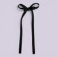 Black large tailed bow clip