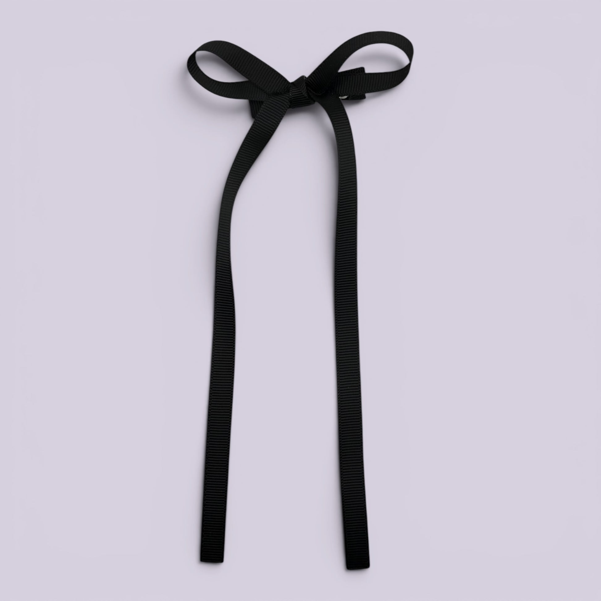 Black large tailed bow clip