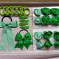 Emerald green school hair bundle contents with matching bows and clips