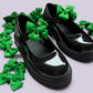 Emerald green shoe bows on school shoes