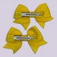 Yellow small bow mini clips for school hairstyles