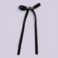 Black tailed bow clip