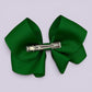 Emerald green bow clip on card