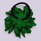 Emerald green korker bow bobble on card
