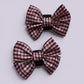 Burgundy maroon gingham shoe bows close up
