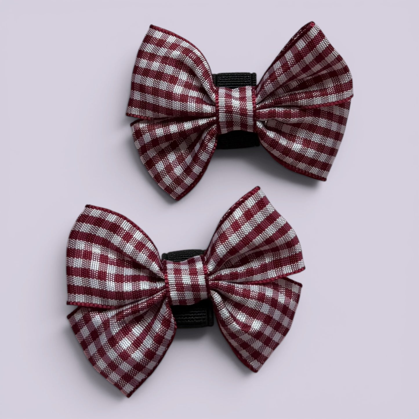 Burgundy maroon gingham shoe bows close up