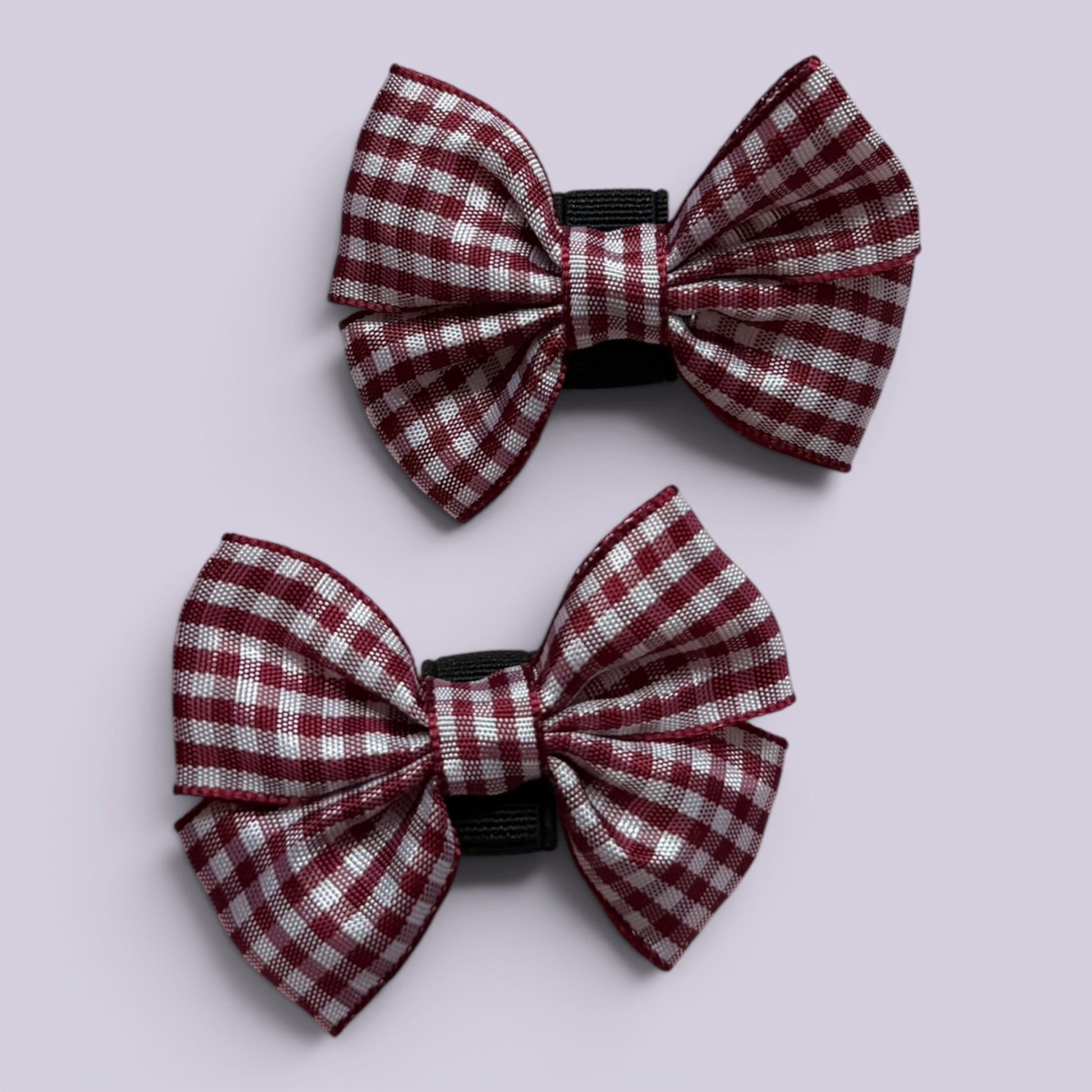 Burgundy maroon gingham shoe bows close up