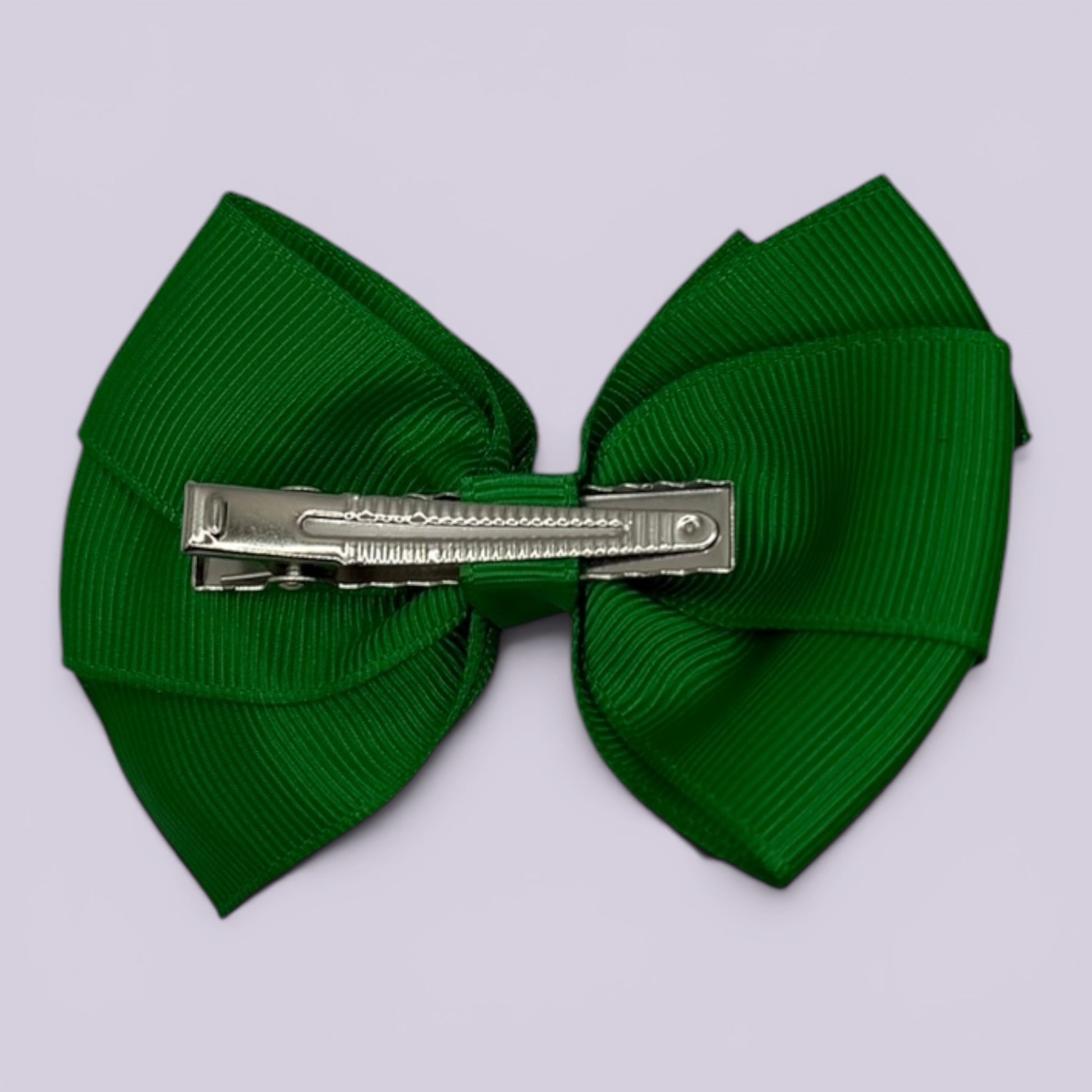 Emerald green pinwheel bow clip on card