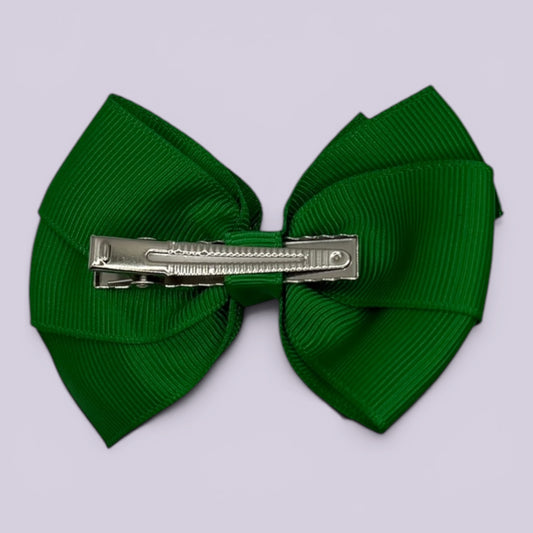 Emerald green pinwheel bow clip on card