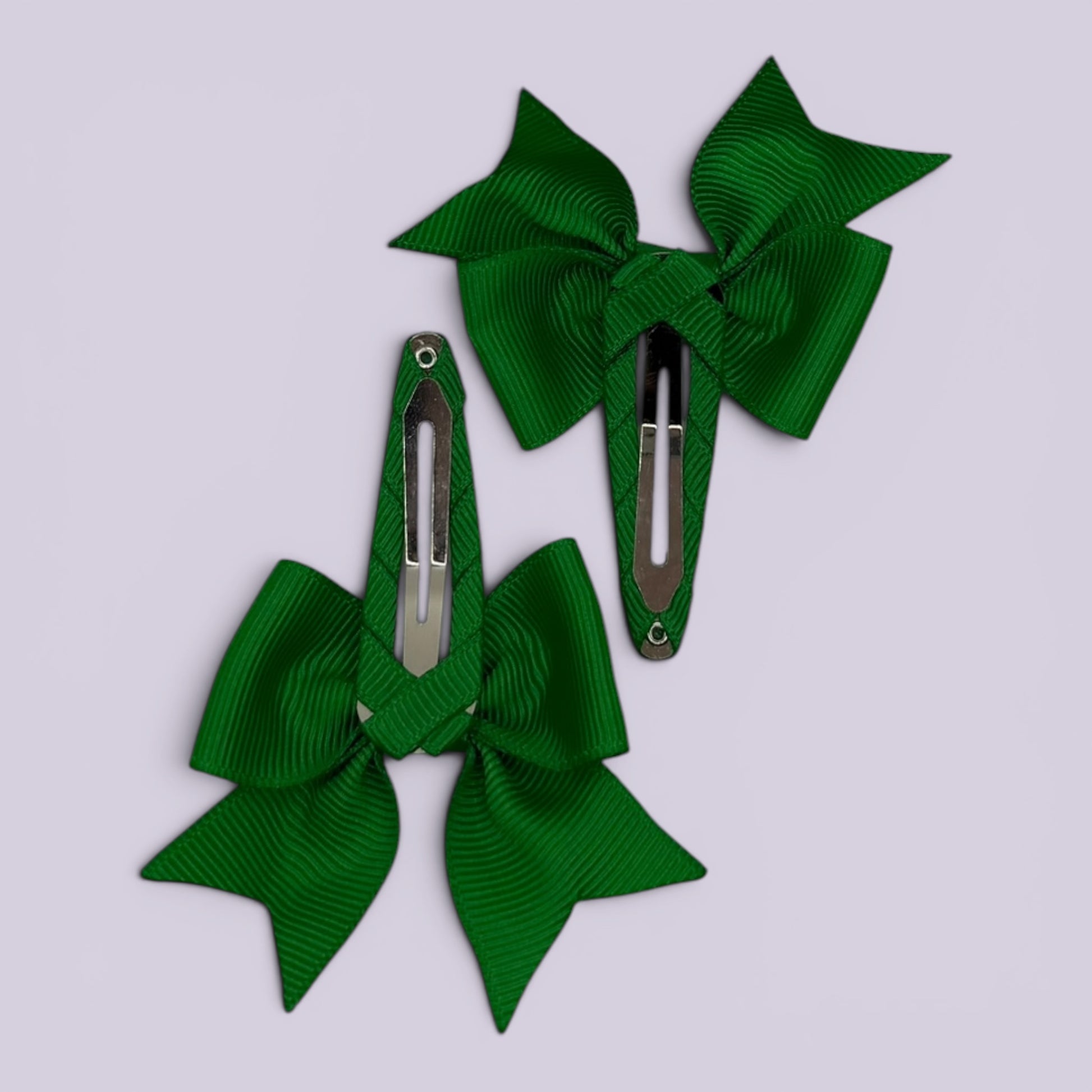 Emerald green butterfly snap clips on card