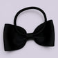 Black bowtie bow bobble on card