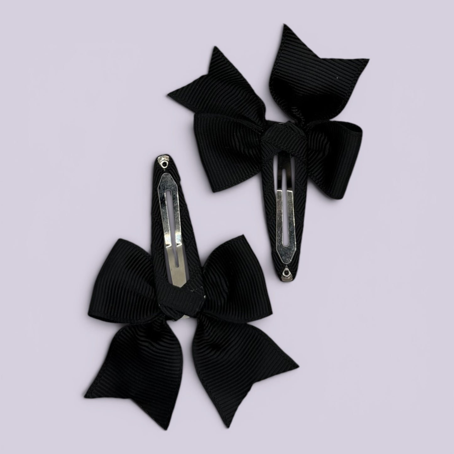 Black butterfly snap clips on card