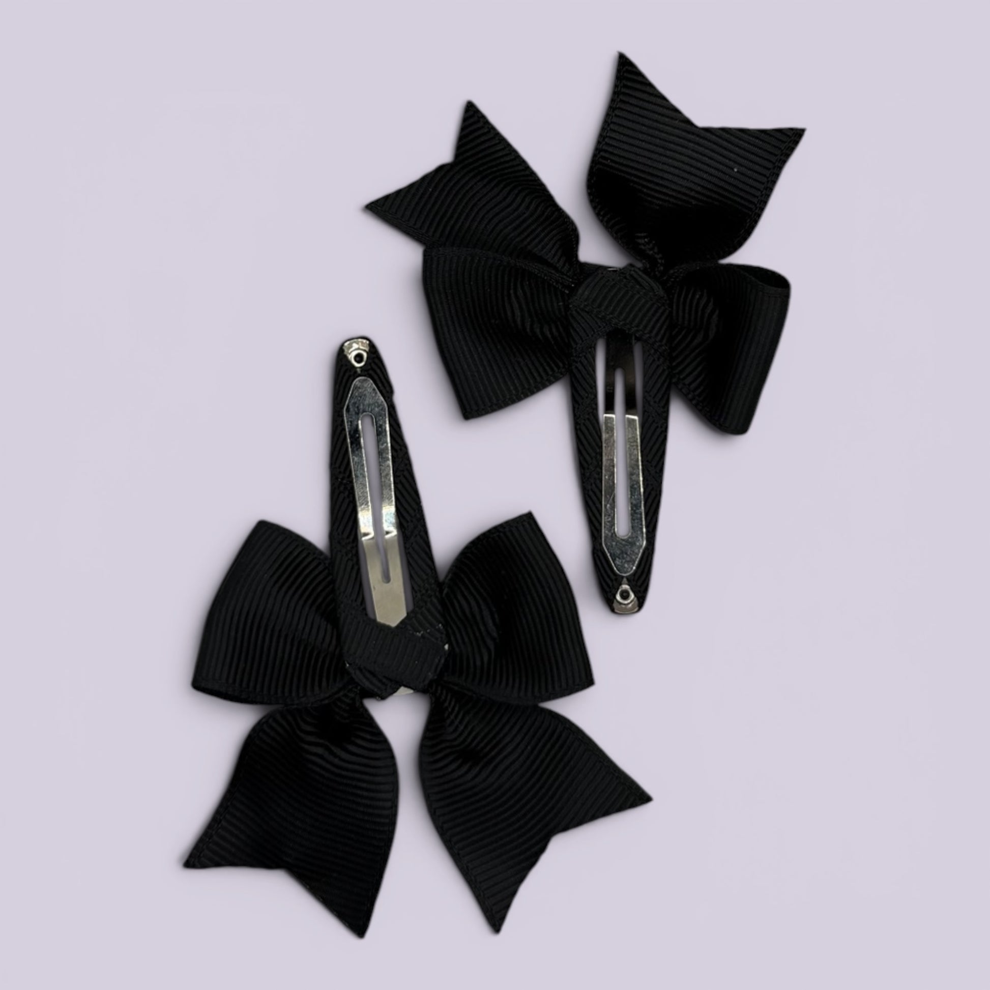 Black butterfly snap clips on card