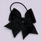 Black four tailed bow bobble on card