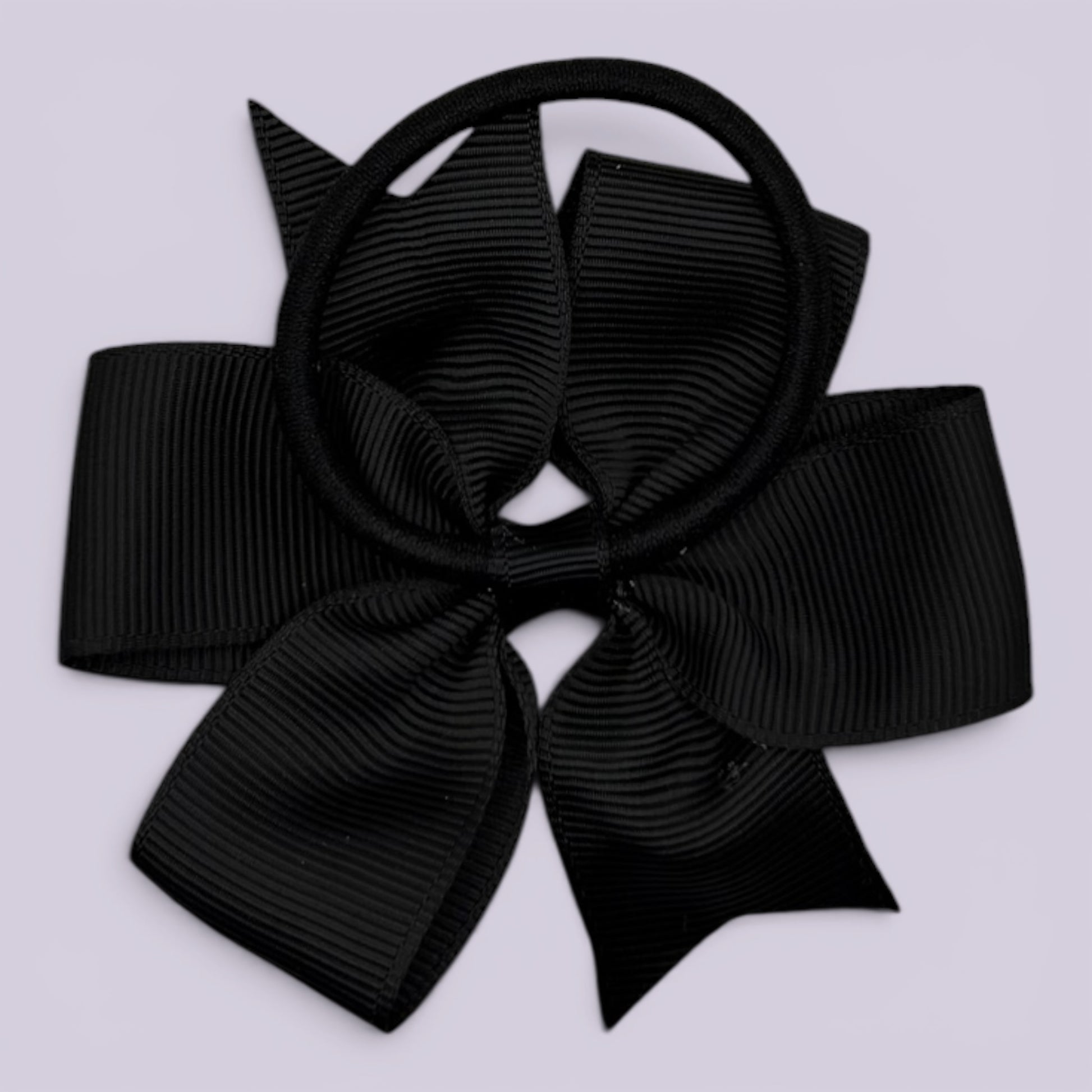 Black pinwheel bow bobble on card
