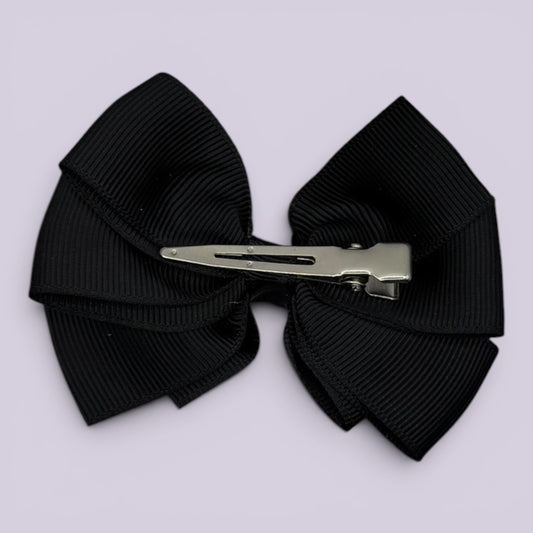 Black pinwheel bow clip on card
