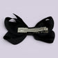 Black small bow clip on card