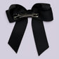 Black tailed bow clip on card