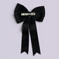 Black tailed bow clip on card
